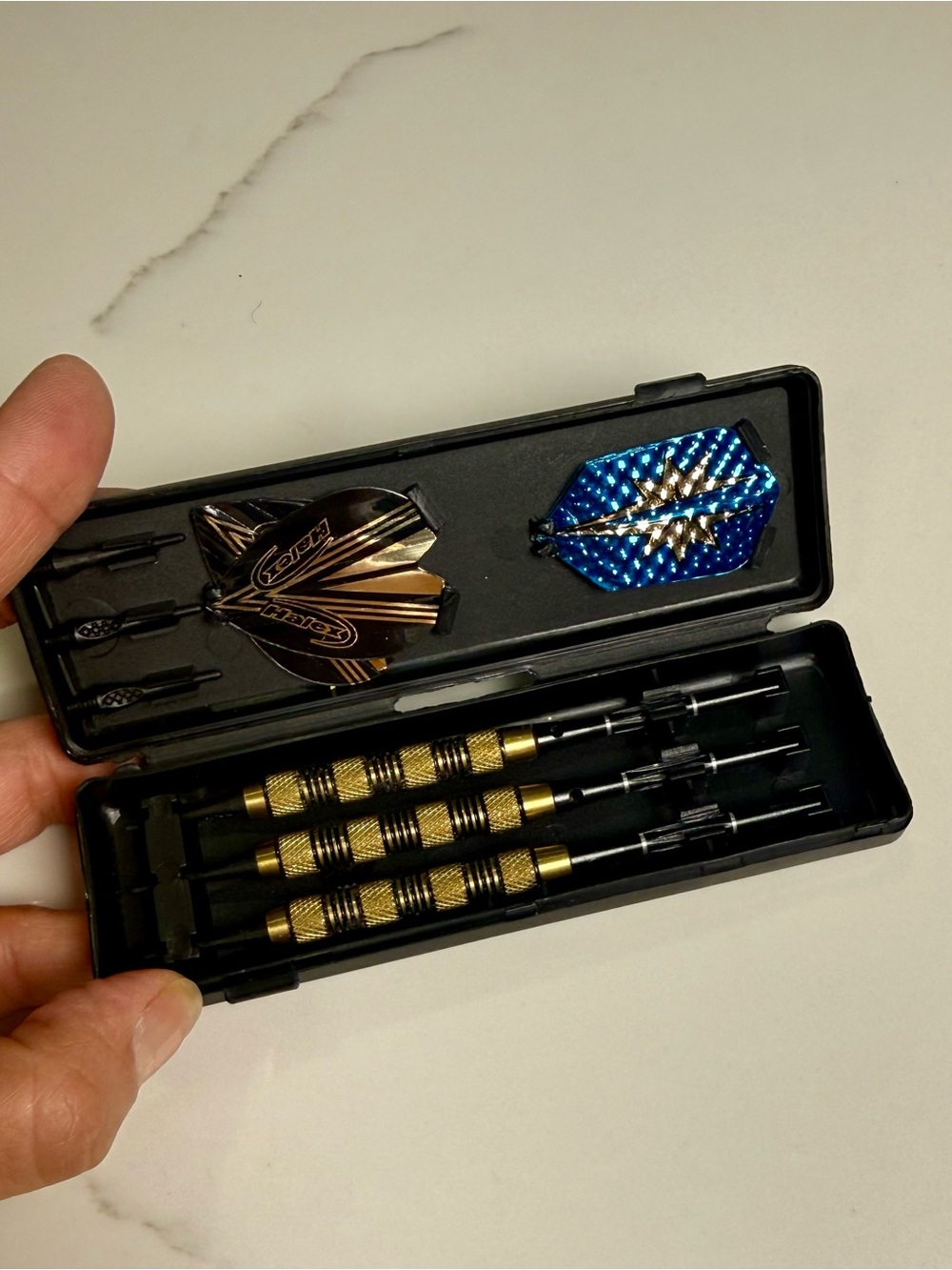 Halex brass soft tip dart set packaged in a black carrying case New